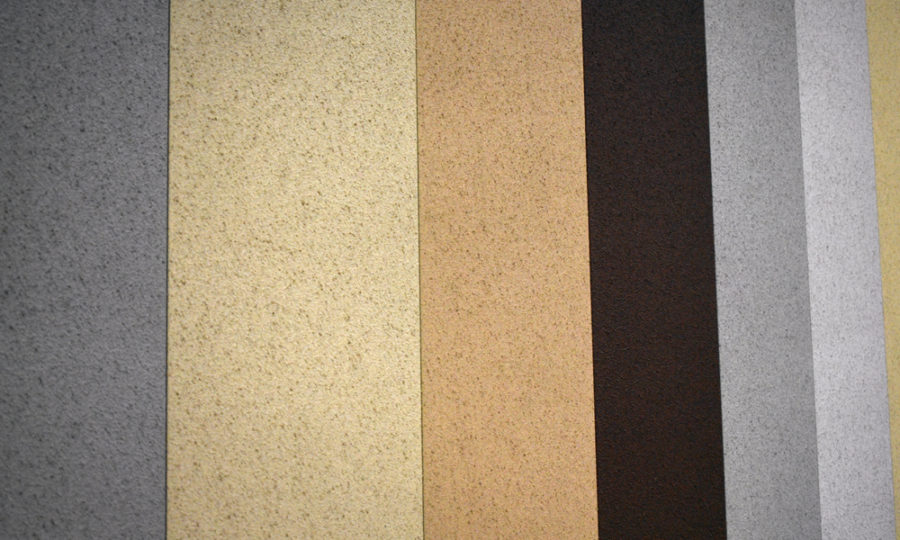Textured metal wall panels in a variety of colors