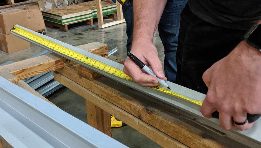 Measuring steel wall panels