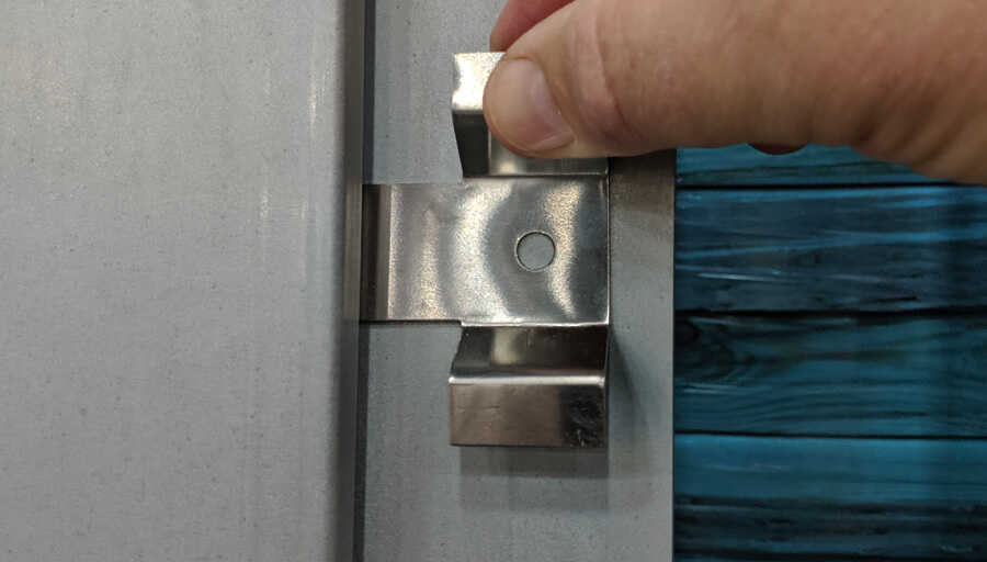 Steel wall panel locking clips