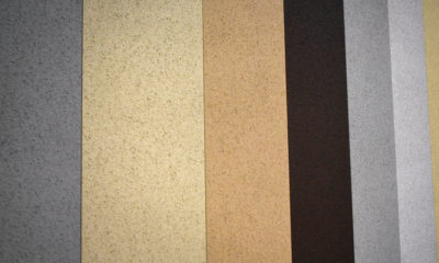 Textured metal wall panels in a variety of colors